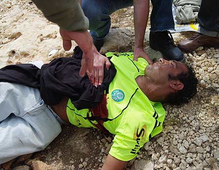 Bassam Abu Rahmah, who was killed within minutes of receiving a direct hit to the chest from an IDF-fired high-velocity tear gas cannister at a regular Friday anti-Wall demonstration on 17 April 2009.