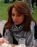 Julia boutros with Palestinian Keffiyeh